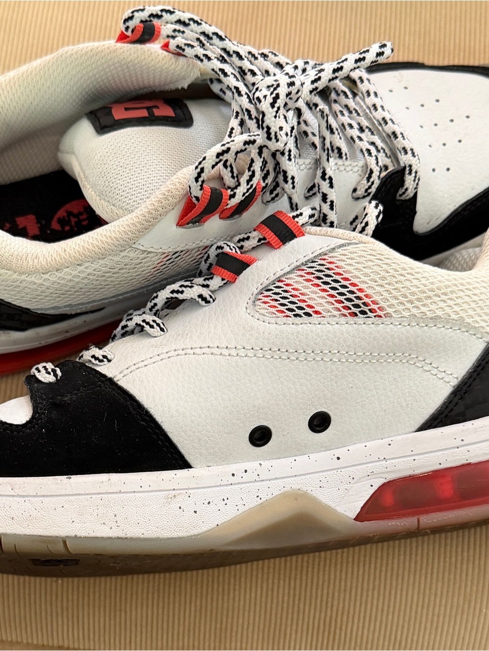 Men's White and Black Athletic Sneakers with Red Accents